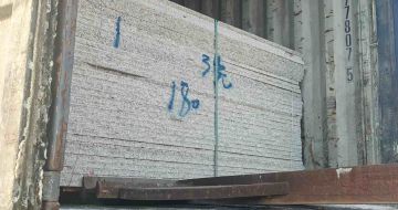 那曲 芝麻白花岗岩石材3.0公分光面毛板装柜出货