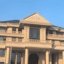 那曲黄金麻别墅外墙干挂石材效果示例