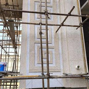 那曲 黄金麻花岗岩别墅外墙干挂回纹造型效果