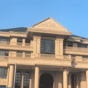 那曲黄金麻别墅外墙干挂石材效果示例