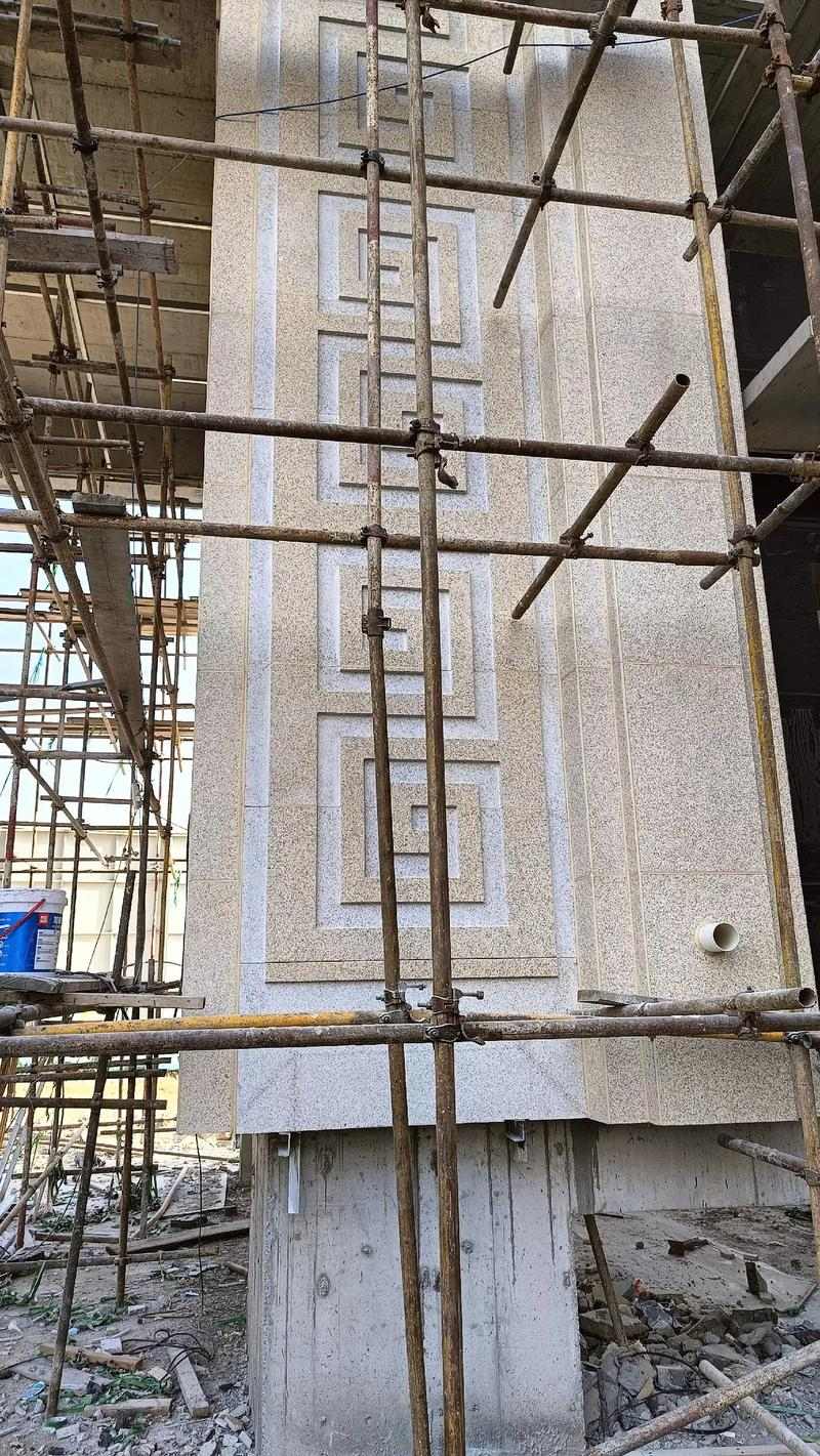 那曲 黄金麻花岗岩别墅外墙干挂回纹造型效果